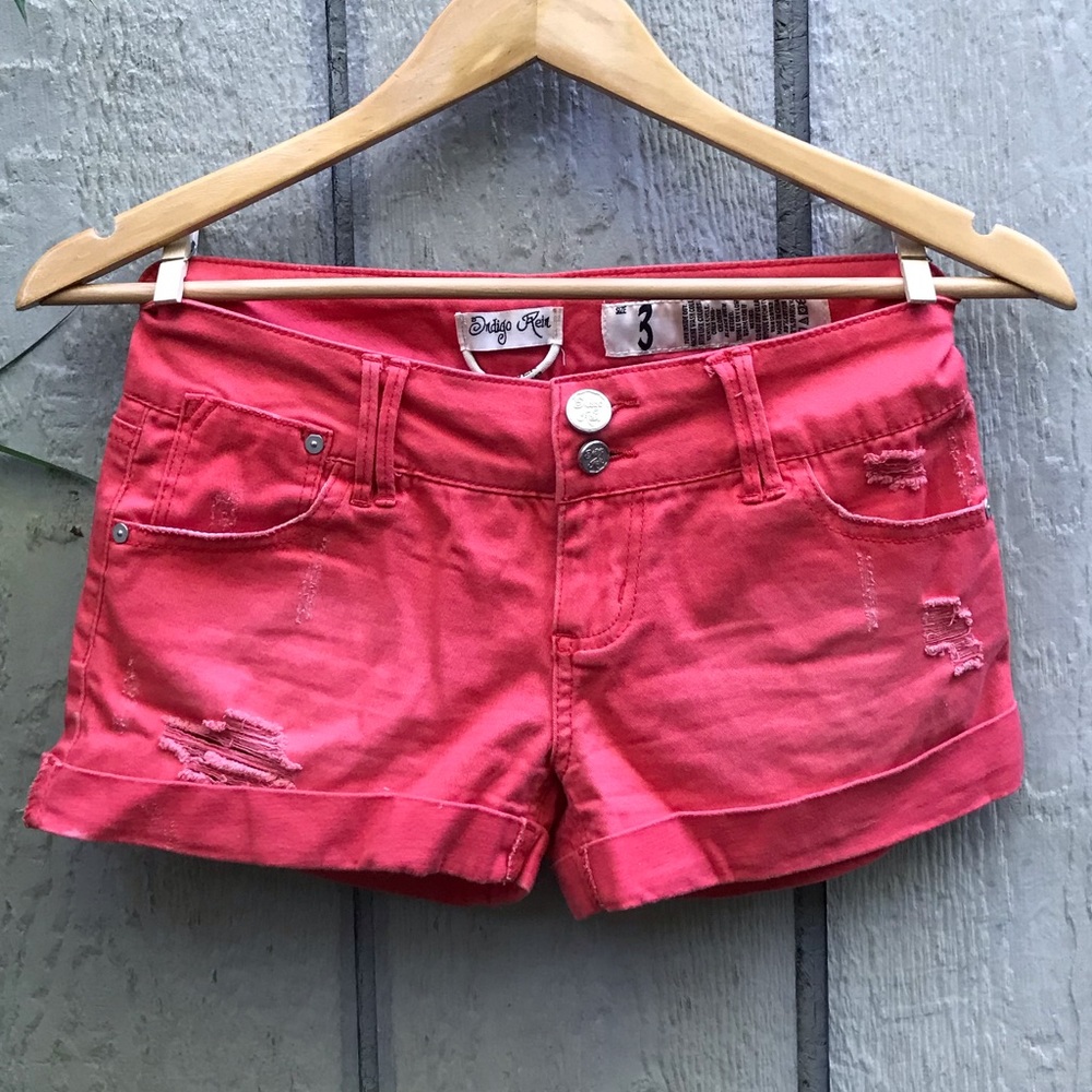 Indigo Rein distressed bright coral pink shorts